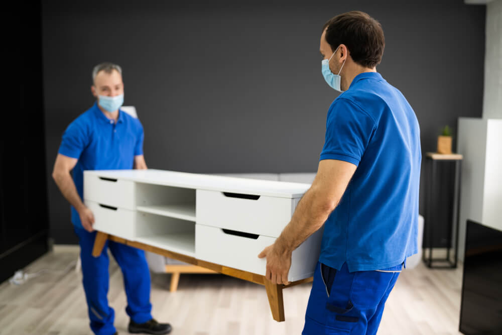 Eustis Movers loading furniture carefully